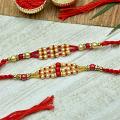Charming Red Beaded Set of 2 Rakhi Charming Red Beaded Set of 2 Rakhi