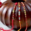 Beautiful Set of 3 Metallic Beaded Rakhi Beautiful Set of 3 Metallic Beaded Rakhi