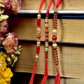 Attractive Crystal & Beaded Set of 3 Rakhi Attractive Crystal & Beaded Set of 3 Rakhi