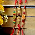 Beautiful Set of 3 Rudraksh & Om Dial Rakhi Beautiful Set of 3 Rudraksh & Om Dial Rakhi