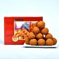 Metal Jaal Work Designer Rakhi with Besan Laddoo Metal Jaal Work Designer Rakhi with Besan Laddoo