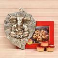 White Metallic Lord Ganesha Wall Hanging and Delicious Soan Puff Hamper White Metallic Lord Ganesha Wall Hanging and Delicious Soan Puff Hamper