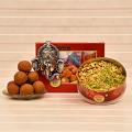 Gajmukh Wall Hanging w/ Pack of Besan Laddoo & Kaju Pudina Namkeen Gajmukh Wall Hanging w/ Pack of Besan Laddoo & Kaju Pudina Namkeen
