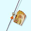 Adorable Rakhi With Orange Tassel and Square Diamond + Roli & Chaval Adorable Rakhi With Orange Tassel and Square Diamond + Roli & Chaval