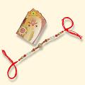 Ganesh Ji Rakhi with Rudraksha beads + Roli & Chaval Ganesh Ji Rakhi with Rudraksha beads + Roli & Chaval