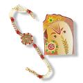 Beautiful Rakhi Bracelet With White Beads + Roli & Chaval Beautiful Rakhi Bracelet With White Beads + Roli & Chaval