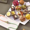 Pastal Meena Rakhi with 12 pcs. Assorted Sweets