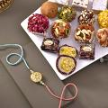 Assorted 12 pcs. Premium Mithai with Rakhi Bracelet Assorted 12 pcs. Premium Mithai with Rakhi Bracelet