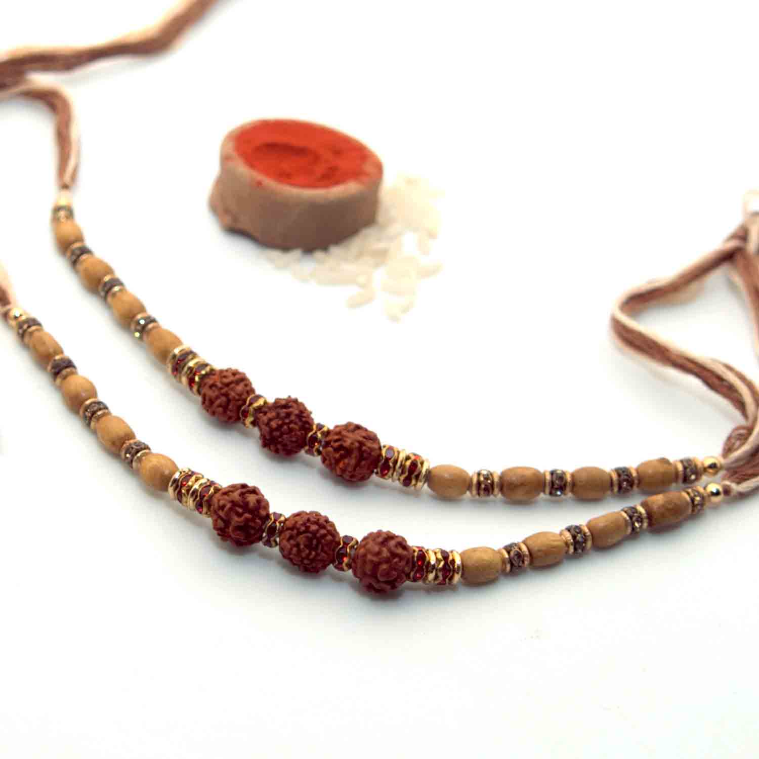 3 Rudraksha Seeds Rakhi – Pack of 2 3 Rudraksha Seeds Rakhi – Pack of 2