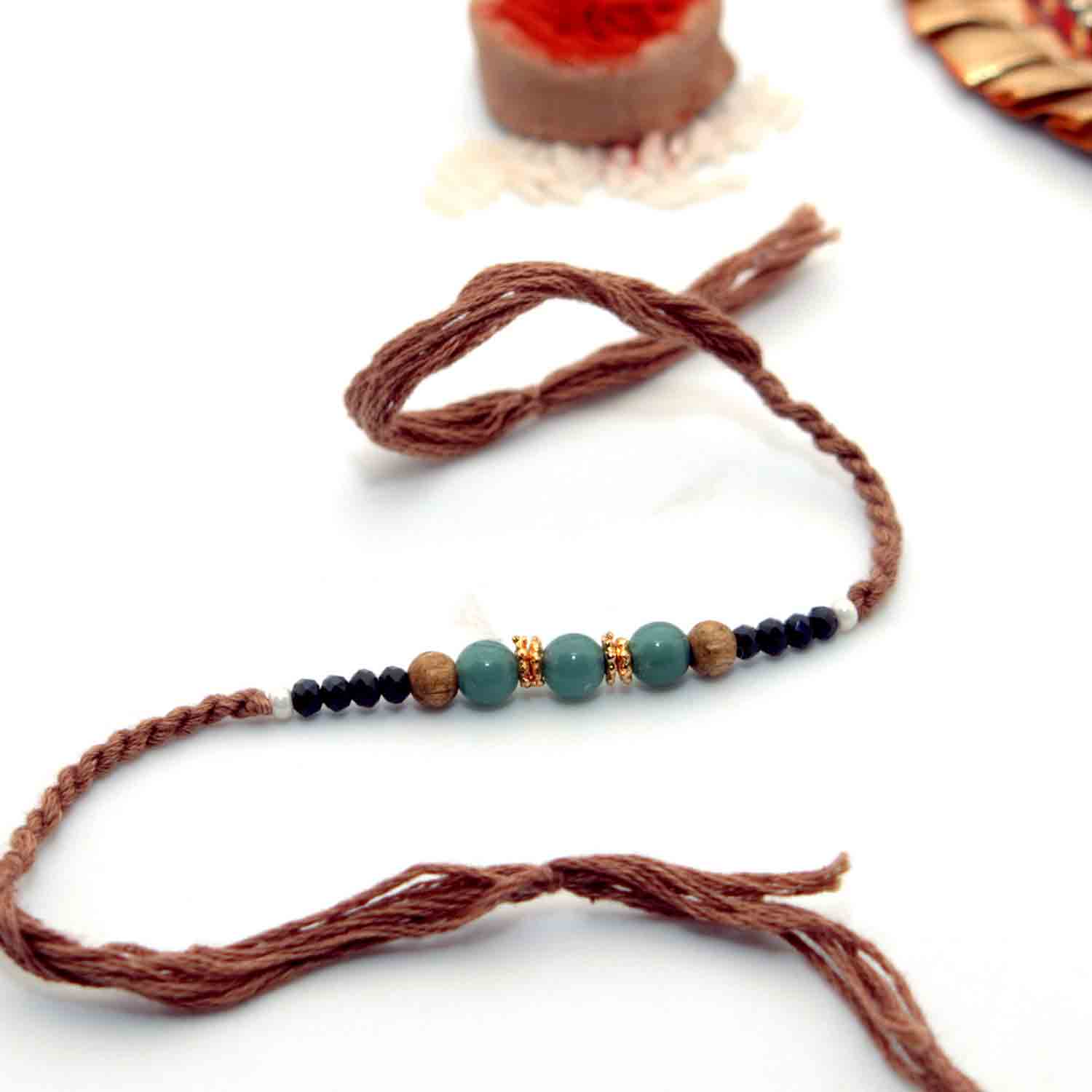 Blue & Black Beads Rakhi With A Blue & Black Beads Rakhi With A