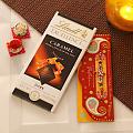 Designer Rakhi w/ Lindt Caramel Chocolate Bar & Roli Chawal Kit Designer Rakhi w/ Lindt Caramel Chocolate Bar & Roli Chawal Kit