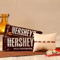 Rakhi Roli-Chawal w/ Two Bars of Hershey's Chocolates Rakhi Roli-Chawal w/ Two Bars of Hershey's Chocolates
