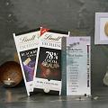 Exclusive Beads & Cz Work Rakhi w/ Two Bars of Lindt Chocolates Exclusive Beads & Cz Work Rakhi w/ Two Bars of Lindt Chocolates