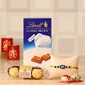 Rakhi w/ A Bar of Lindt Classic Chocolate & Roli-Chawal Kit Rakhi w/ A Bar of Lindt Classic Chocolate & Roli-Chawal Kit