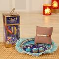 Rakhi w/ A Pack of Lindt Chocolates & Puja Thali For Roli-Chawal. Rakhi w/ A Pack of Lindt Chocolates & Puja Thali For Roli-Chawal.