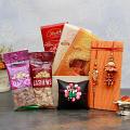 Attractive Family Rakhi Set w/ Lindt Chocolate Pack & Dry Fruits In A Basket Attractive Family Rakhi Set w/ Lindt Chocolate Pack & Dry Fruits In A Basket