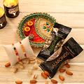 Two Rakhis w/ Roasted Almonds & Pista & Decorated Puja Thali Two Rakhis w/ Roasted Almonds & Pista & Decorated Puja Thali