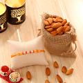 Traditional Rakhi w/ Almonds & Roli-Chawal Traditional Rakhi w/ Almonds & Roli-Chawal