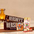 Set of Two Doraemon Rakhis Hershey's Chocolates for Kids Set of Two Doraemon Rakhis Hershey's Chocolates for Kids