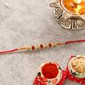 Elegant Divine Design Rudraksh Rakhi Elegant Divine Design Rudraksh Rakhi