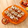 Motichoor Laddoo with Traditional Tikka Puja Thali Motichoor Laddoo with Traditional Tikka Puja Thali