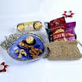 Bhaidooj Tikka w/ Ferrero Rocher & Dryfruits in Metal Bowl Bhaidooj Tikka w/ Ferrero Rocher & Dryfruits in Metal Bowl