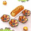 Set of 4 Beautiful Clay Diyas w/ Orange Dry Fruit Casatta Roll Set of 4 Beautiful Clay Diyas w/ Orange Dry Fruit Casatta Roll