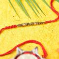 Send Antique Work Rakhi w/ Beads in USA to Brother