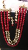 Red Pearls Kundan Necklace Set With Necklace, Earrings & Tikka