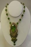 Green enamel & stone gold plated pendant set