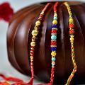 Multicolored Set of 3 Beaded Rakhi Multicolored Set of 3 Beaded Rakhi