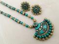 Trendy Terracotta Set in Dark Green & Gold with Big Studs Trendy Terracotta Set in Dark Green & Gold with Big Studs